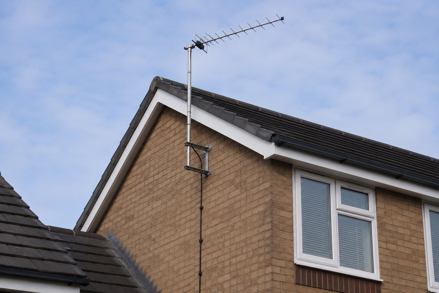 External TV aerial mounted on a Birmingham house wall